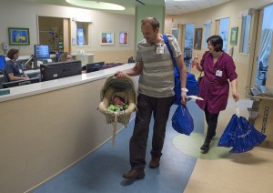 Ratko and Vera Mijatovic leave the Neonatal Intensive Care Unit (NICU) at Spectrum Health Helen DeVos Children’s Hospital with their son Stefan.